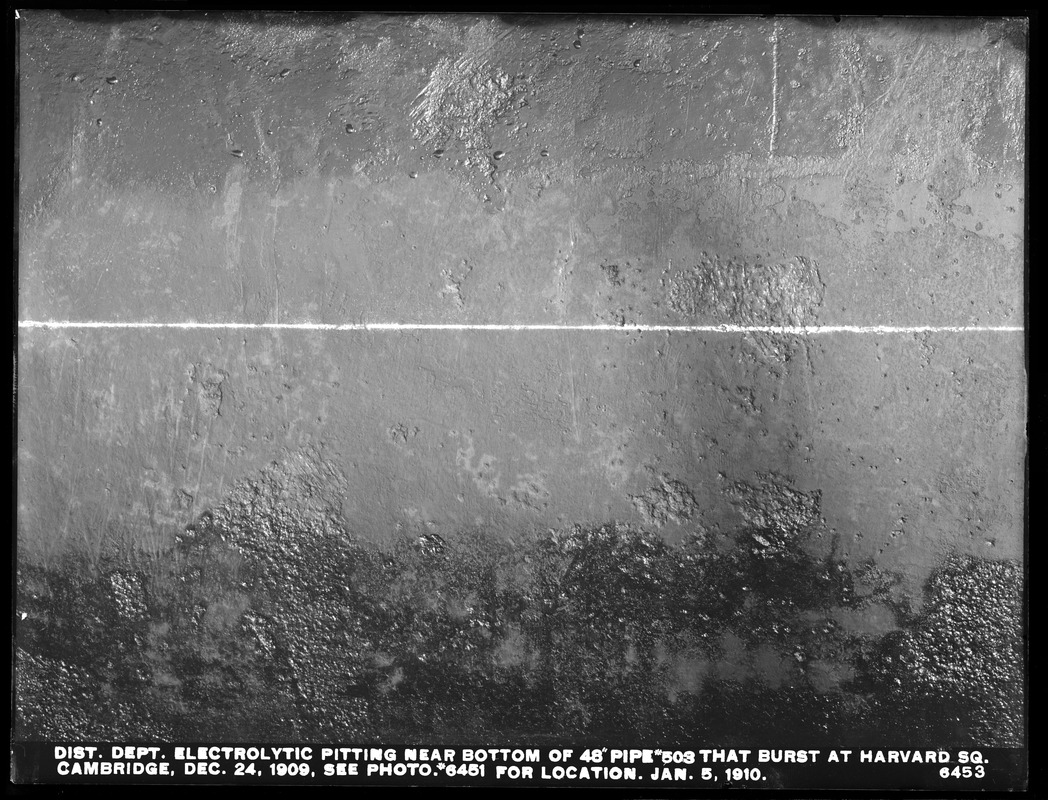 Distribution Department, break; electrolysis, electrolytic pitting near bottom of 48-inch pipe No. 503 that burst on December 24, 1909 at Harvard Square (compare with No. 6451 for location), Cambridge, Mass., Jan. 5, 1910