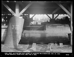 Distribution Department, break; electrolysis, 48-inch pipe No. 503 that burst on December 24, 1909 at Harvard Square, after removal from pipe line, Cambridge, Mass., Jan. 5, 1910
