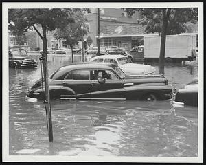 Fluid Drive---Summer shoppers made a big splash along Route 9, Chestnut Hill.