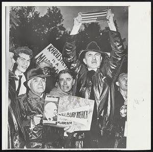 Demonstrations, such as this one, against Soviet Premier Khrushchev's visit to the U.N. have been protested by ranking Russian officials. They say demonstrators' charges are untrue and police are remiss in failing to quell them. Police say there is no law against pickets so long as they keep their distance and do not endanger Khrushchev.
