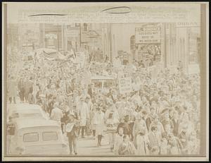 Thousands of demonstrators march in downtown San Francisco in an anti-Vietnam war protest parade, as they wend their way to Kezar Stadium (4 miles away) to a "peace fair." Police estimated 25,000 persons participated in the parade, the largest peace demonstration in West Coast history.