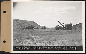 Contract No. 93, Completion of East Branch Baffle, Petersham (formerly in the Town of Greenwich), and Hardwick, looking southwesterly at east branch baffle from field north of baffle, Hardwick, Mass., Nov. 13, 1939