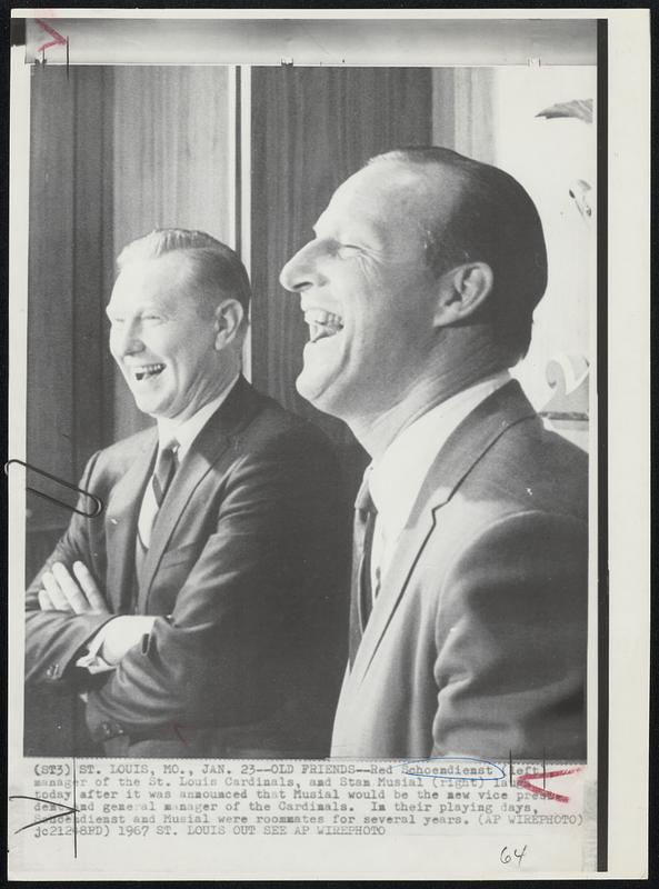 Old Friends -- Red Schoendienst (left) manager of the St. Louis Cardinals, and Stan Musial (right) laugh today after it was announced that Musial would be the new vice president and general manager of the Cardinals. In their playing days, Schoendienst and Musial were roommates for several years.