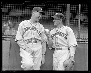 2 Dodgers holding ball