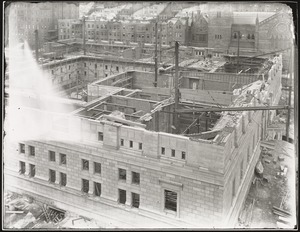 View of the McKim building under construction, taken from the old S. S. Pierce building