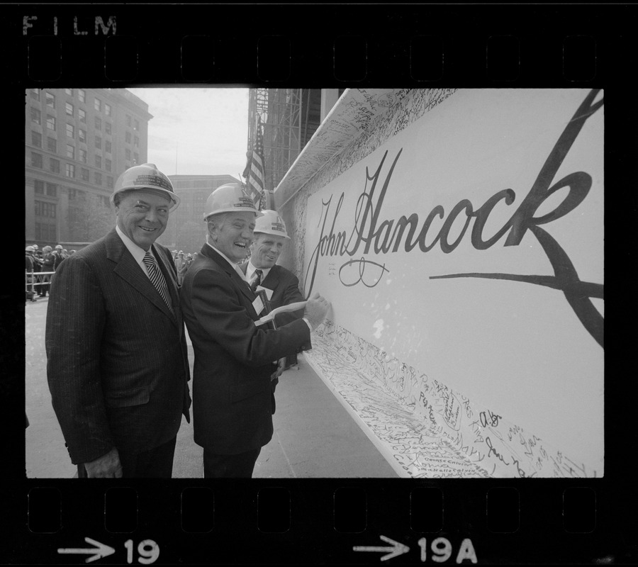 Gerhard Bleicken, Chairman, Frank Maher, President, both of John Hancock  Mutual Insurance Company, and Mayor Kevin White signing the beam during the  topping off ceremony for the new tower - Digital Commonwealth