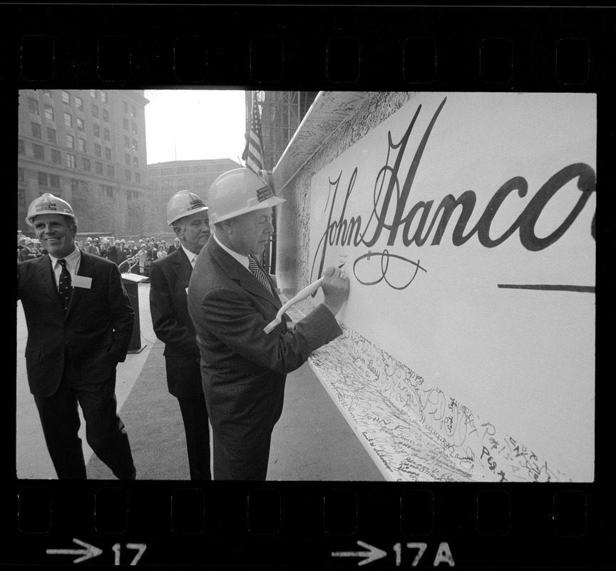 Gerhard Bleicken, Chairman, Frank Maher, President, both of John Hancock Mutual Insurance Company, and Mayor Kevin White signing the beam during the "topping off" ceremony for the new tower