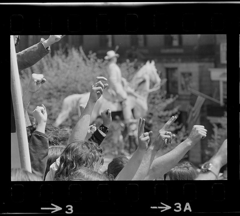 Angry fists at Kent State Massacre rally at State House, Boston