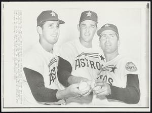 New Pitchers for Houston -- These three new Houston pitchers, from left: Gary Kroll; Barry Latman and Ron Taylor, compare their grips on the baseball after reporting to the baseball spring training camp at Cocoa, Fla.