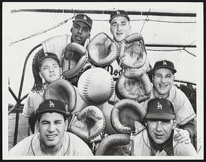 Aspiring Dodger catching candidates who are fighting for Roy Campanella’s job. Front row are Mike Napoli, left, and Al (Rube) Walker; middle-Herb Olsen, left, and Joe Pignatano; top-John Roseboro, left, and Jim Korenda.