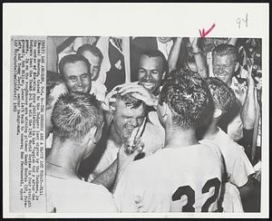 The Dodgers are a Happy Lot Today--Bill (Moose) Skowron, traded to the Dodgers last winter by the Yankees, is the center of dressing room jubilation in Los Angeles today after the Dodgers beat the Yanks 2-1 to win the 1963 World Series in four straight games. In on the roughhouse are winning pitcher Sandy Koufax (32, foreground), Bob Miller, lower left back to camera; Ron Perranoski, upper left, and Tommy Davis, center background.
