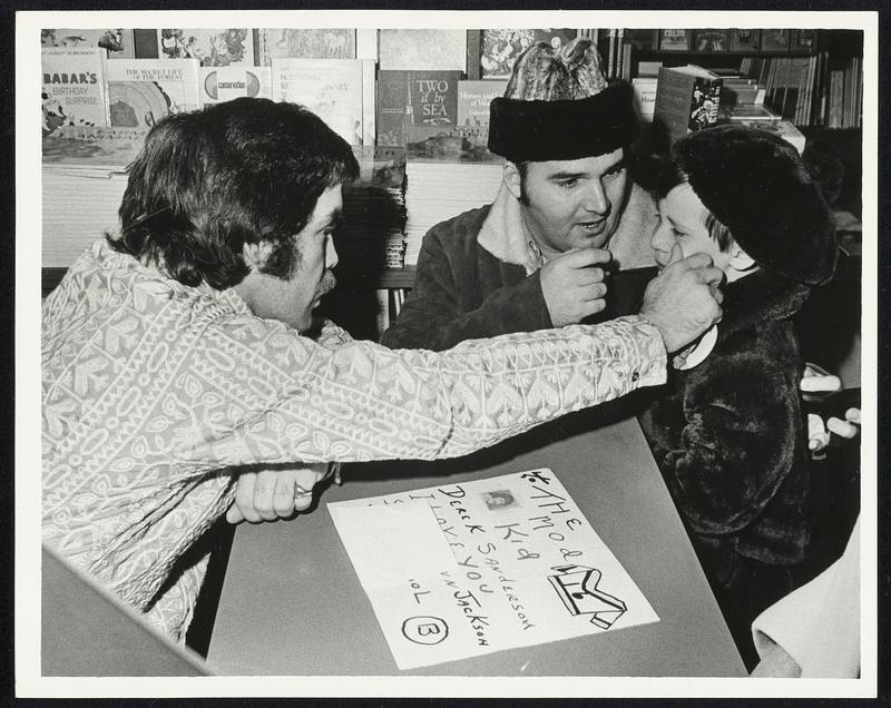 Others got hysteric and nutty, but little Sherry Ann Jackson (6) cried, when she saw Derek Sanderson at the Lauriats Bookstore. Her father Thomas Jackson of Charleston is center