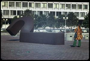 A woman standing by outdoor artwork, Boston City Hall plaza