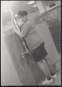 Anna posing next to a pipe