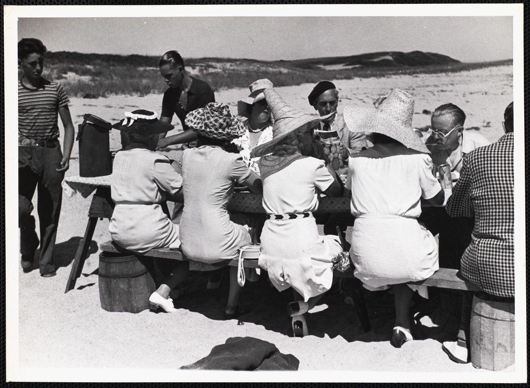 Siasconset clam bake Mr + Mrs B Long (man in beret + woman on his right) women with backs to camera - Mrs Beale, Mrs Snow, Mrs Jim Hutton + Mrs Eichelbergh