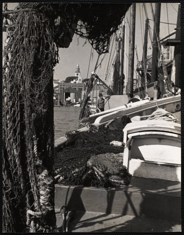 Nantucket. South tower thru nets of fishing boats here at Old South Wharf.