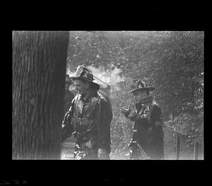 Fireman look at blaze, Dorchester