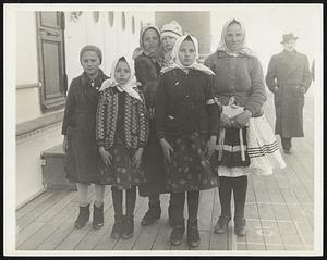 Old World Color In New York. New York, Jan. 22 – A group of Young Immigrants on board at the S.S. Champlain when it docked here brought a bit of old world color to Manhattan. They are the Sivik family, traveling from Czecho-Slovakia to Hamilton, Ontario.