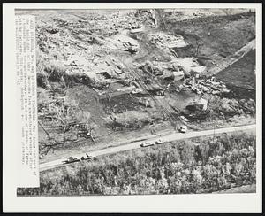 Primrose, Neb. - Farm Flattened - The house and most of the buildings of this Nebraska farm are shattered wreckage after a tornado moved through Saturday. It was one of dozens of farms hit by twisters. This aerial photograph was taken yesterday.