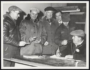 Boston Longshoremen Voting yesterday at Commonwealth Pier on possible strike resumption. From left, Thomas Feehan, Lawrence Trainor, Joseph Green, Paul Cocchi, Robert Cunniff and Thomas Lydon, observer.