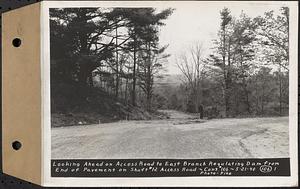 Contract No. 106, Improvement of Access Roads, Middle and East Branch Regulating Dams, and Quabbin Reservoir Area, Hardwick, Petersham, New Salem, Belchertown, looking ahead on access road to East Branch Regulating Dam from end of pavement on Shaft 12 access road, Belchertown, Mass., May 21, 1940