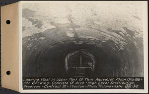 Contract No. 80, High Level Distribution Reservoir, Weston, looking west in upper part of twin aqueduct from Sta. 886+50+/- showing concrete of arch, high level distribution reservoir, Weston, Mass., Apr. 23, 1940