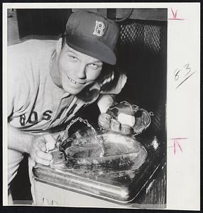 Cool Customer Cools Off with a cool drink but Red Sox pitcher Al Schroll was hot stuff last night in chilling the Indians at Cleveland 4-1 to get the Hose out of the cellar.