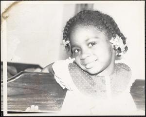 Smiling girl with braids