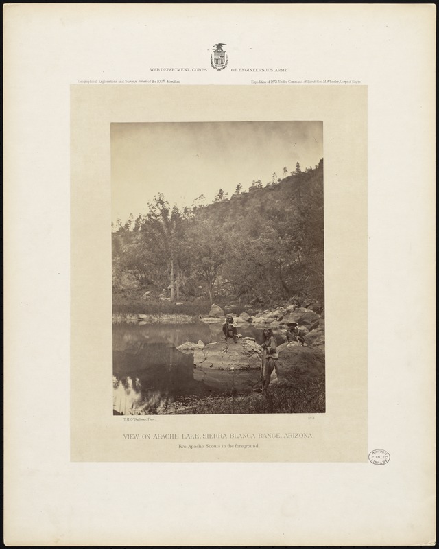 View on Apache Lake, Sierra Blanca Range, Arizona. Two Apache scouts in the foreground