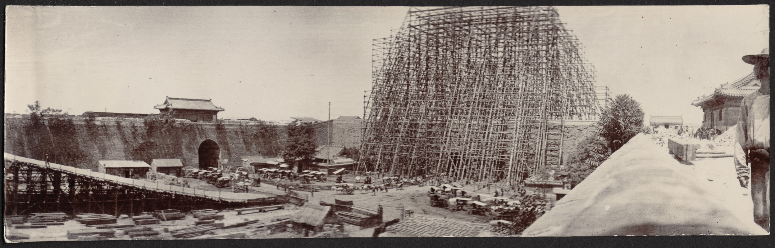 Construction of Foreign Legation quarter; scaffolding at main gate