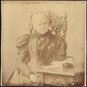 Jane Armington Brown seated in carved wooden chair