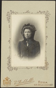 Woman in dark dress/overcoat and bonnet