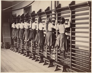 Charlestown High School (girls exercising on bars against the wall)