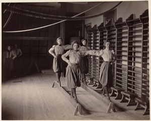 Charlestown High School (girls exercising on balance beams)