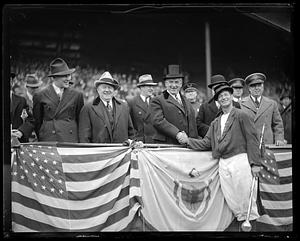 James Curley shaking a man's hand