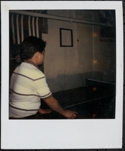 Boy playing ping pong