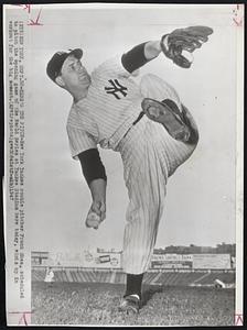 Here’s The Pitch -- New York Yankee rookie pitcher Frank Shea, scheduled to pitch the opening game of the World Series at Yankee Stadium here today, winds up in workout for the big moment.
