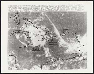 Miami, Fla: Hurricane Inez and tropical storm "Judith" are shown from weather satellite picture taken by ESSA II early 9/30. Winds of 138mph are reportedly hitting the tip of Cuba this morning. Sixty-nine deaths are now attributed to hurricane "Inez" as it moved over the Dominican Guadeloupe, and Haiti.