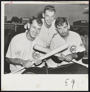 They Wrecked The Dodgers – Chicago Cubs Pitcher Paul Minner (center) musses the hair of First Baseman Dee Fondy (left) and Third Baseman Ransom Jackson (right) in dressing room after yesterday’s game with the Dodgers which Cubs won, 14-4. Fondy smashed two homers and a double, while Jackson hit two homers to account for nine of the Cubs’ runs.
