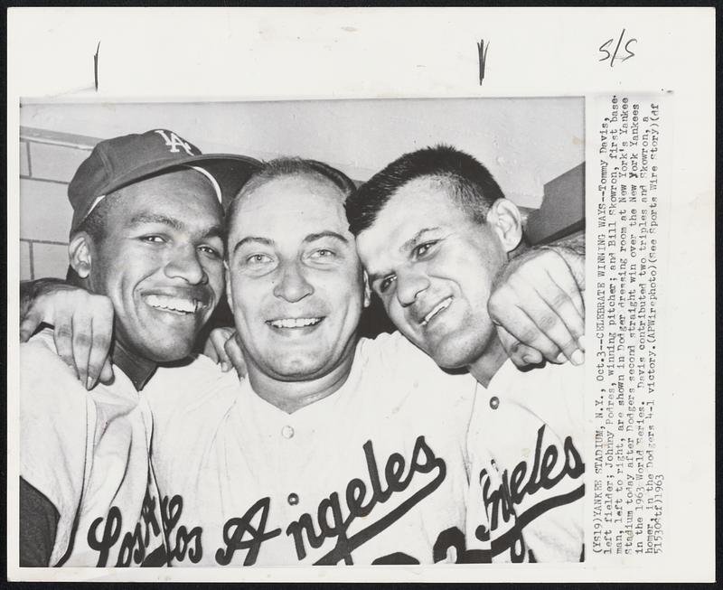 Celebrate Winning Ways--Tommy Davis, left fielder; Johnny Podres, winning pitcher; and Bill Skowron, first baseman, left to right, are shown in Dodger dressing room at New York’s Yankee Stadium today after Dodgers second straight win over the New York Yankees in the 1963 World Series. Davis contributed two triples and Skowron, a homer, in the Dodgers 4-1 victory.