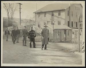 Pickets At Canton – Demanding pay boosts because of rising prices, these striking members of the CIO Textile Workers Union picketed the Neponset Woolen Mills at Canton. Their lines were duplicated at some 160 mills, mostly in New England, as 70,000 woolen and worsted workers struck.