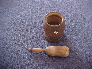 Wooden container with tool