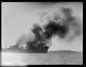 SS Coyote being burned for scrap
