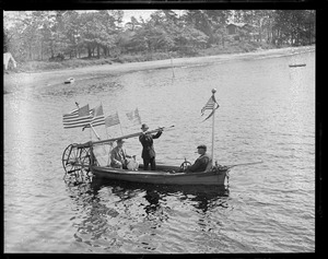 Odd three-man paddleboat at Wareham