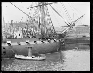 Roto ship built by MIT students next to USS Constitution