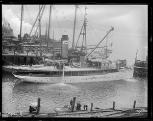 Edsel Ford's yacht Sialia being pumped out at Atlantic Works, East Boston.