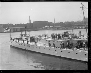 Men on the deck of HMS Constance at Navy Yard