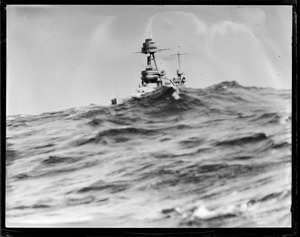 Warship in rough sea
