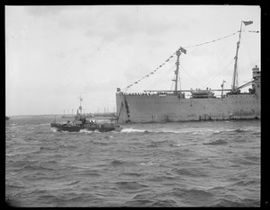 SS George Washington sticks her nose into Boston Harbor with President Wilson on board, flight from France. Heavily guarded. - Sunday night.