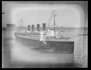 Tugboats Taurus and Luna bring SS France into Harbor